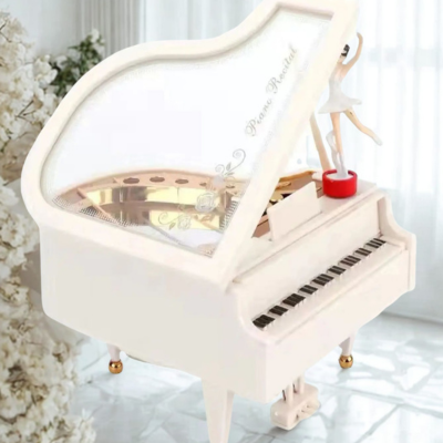 Boite a musique et poupee danceuse