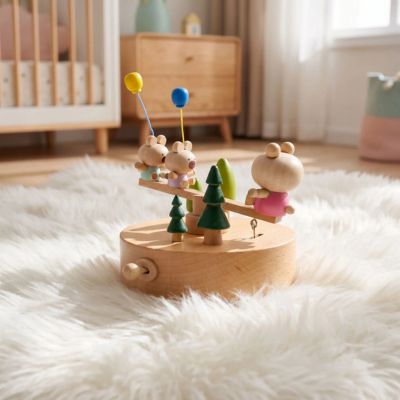 Boite musique bebe est posee sur un tapis blanc