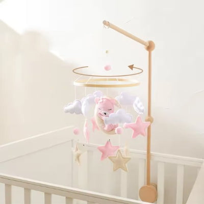 Mobile bébé et ourson se déplace dans les nuages