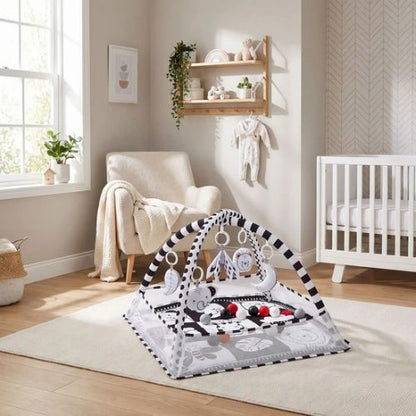 Tapis eveil bebe tres jolie dans la chambre de bebe